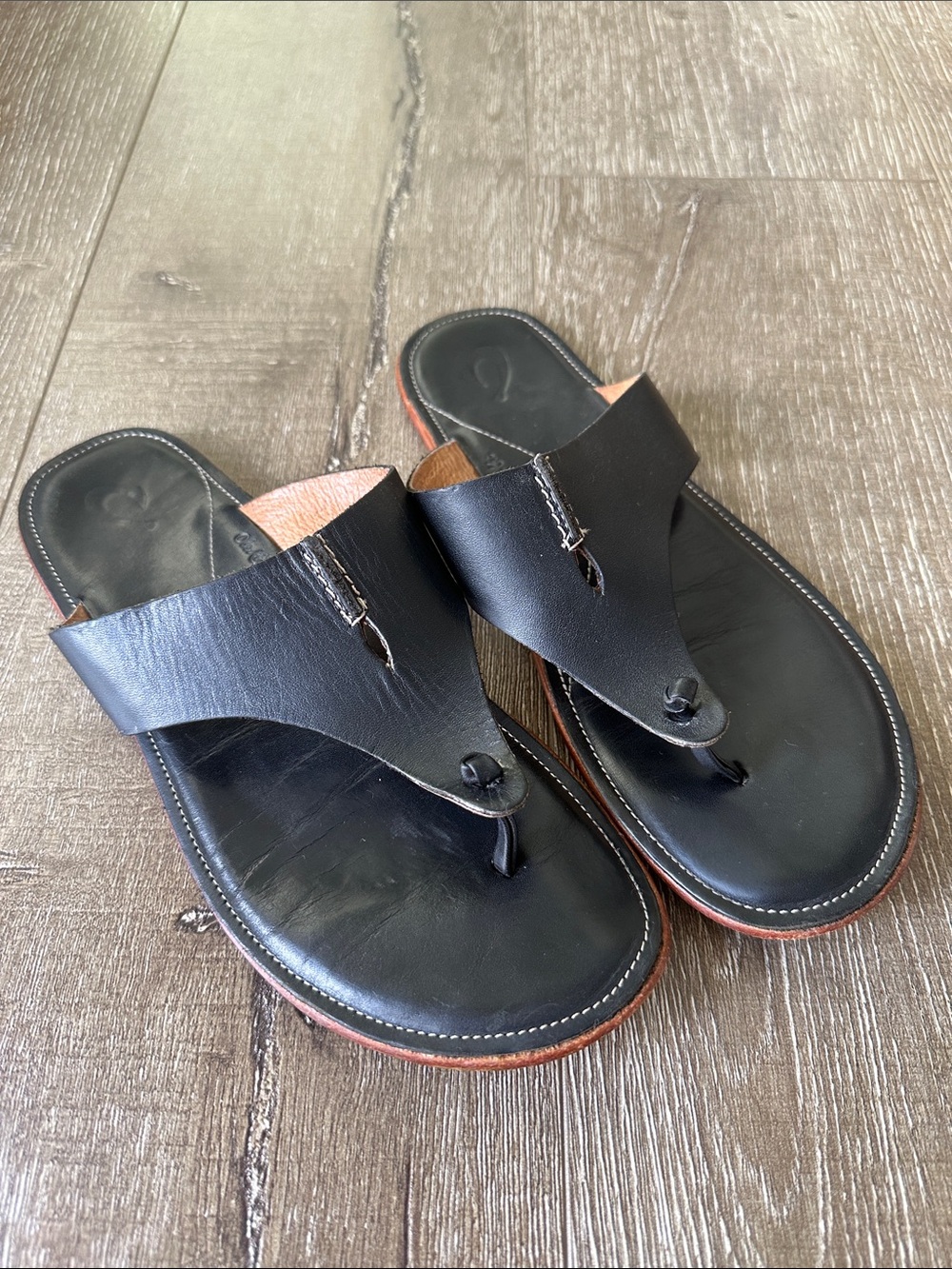Olukai Hema Black Leather Sandals